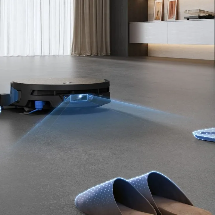 Robot rozpoznaje przeszkody i omija je podczas sprzątania /Źródło: Ecovacs